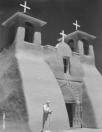 Santo in Front of Church